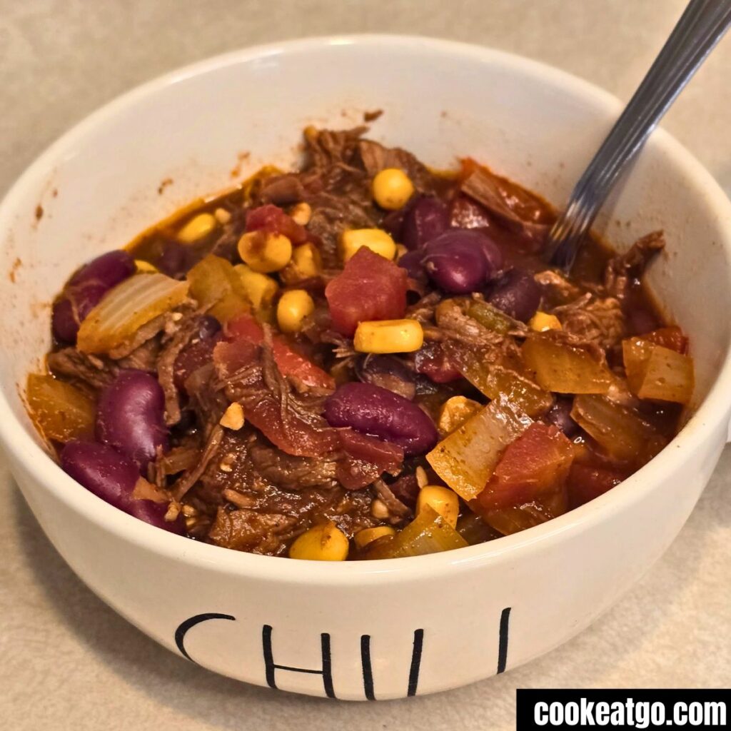 Slow Cooker Birria Chili served in white bowl