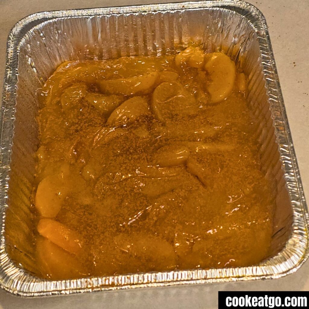Peach pie filling with apple pie seasoning on it