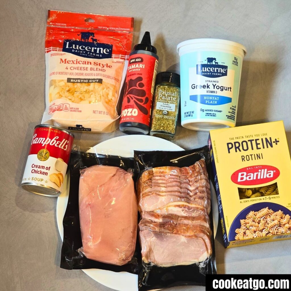 Chicke breast, candain bacon, protein pasta, cream of chicken, primal palate adobo seasoning, cheese, greek yogurt, and jozo tamari Soy Sauce for easy chicken bacon bake