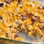 Chicken and Bacon Pasta Bake Served in casserole dish with piece missing