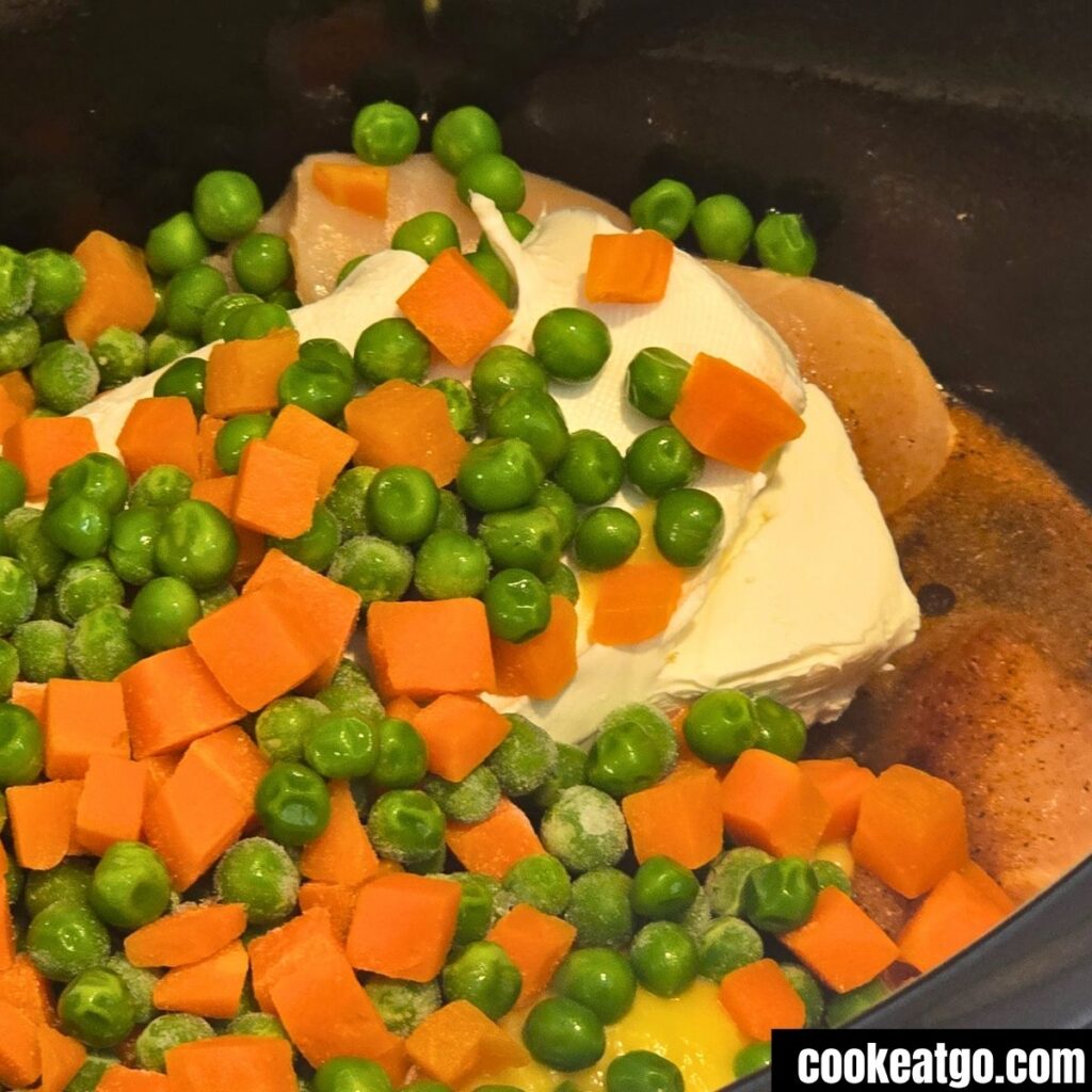 Slow Cooker Chicken Pot Pie Pasta Before Cooking in crockpot