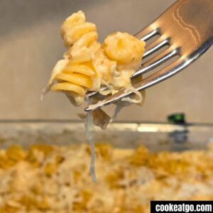 Fork pulling up a piece of Creamy Italian Chicken Bake