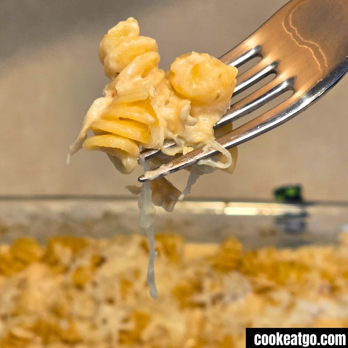 Fork pulling up a piece of Creamy Italian Chicken Bake